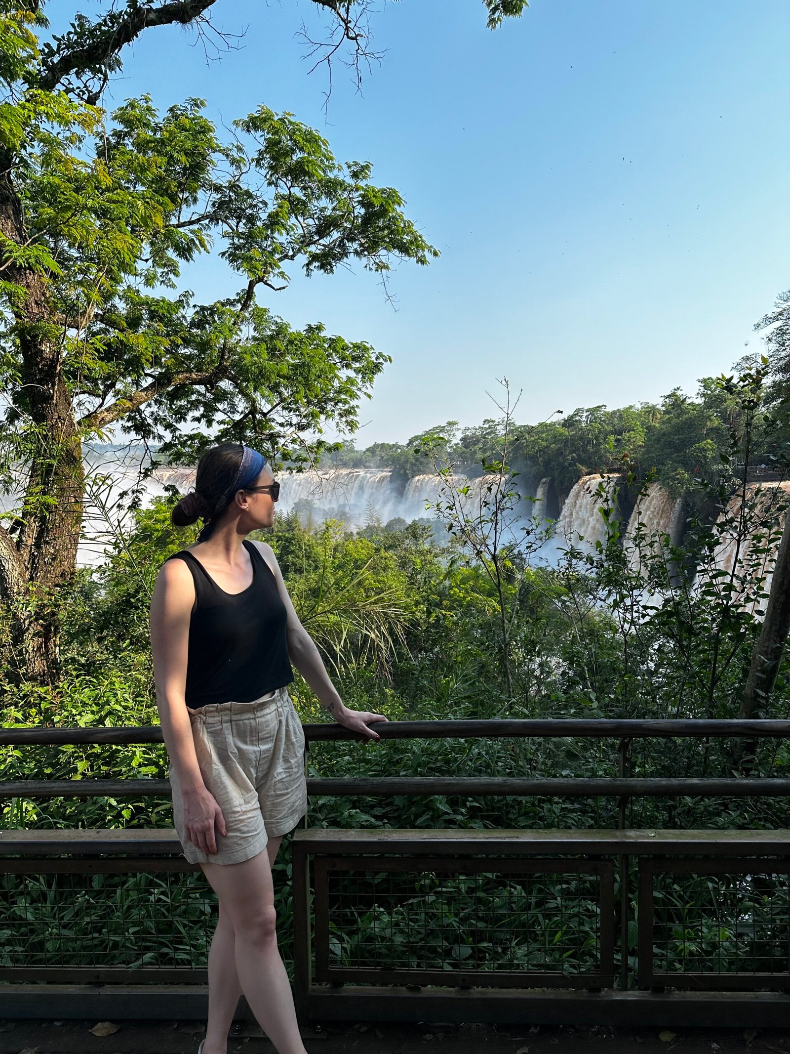 Girl standing in front of Iguazu Falls, Argentina